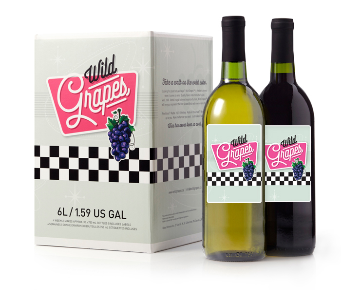 A photo of a bottle of white wine and a bottle of red wine standing next to a Wild Grapes wine making kit box.